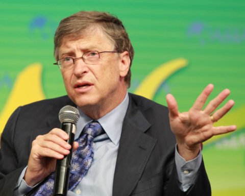 Picture of Bill Gates speaking on a microphone