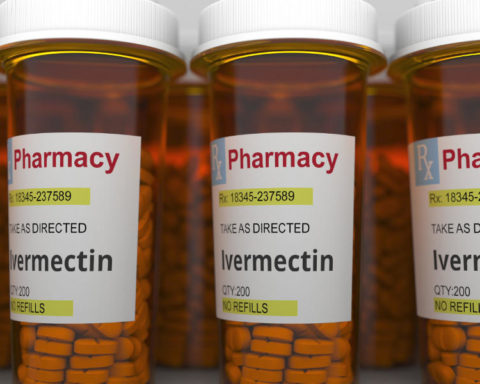 Pharmacy vials with ivermectin generic drug pills as a possible coronavirus disease treatment. 3D rendering